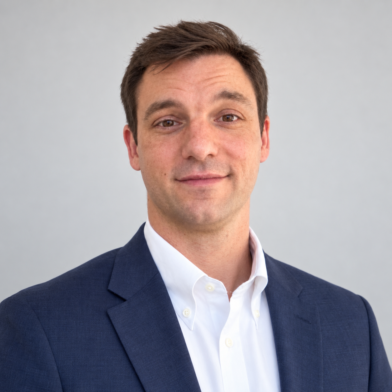 Justin Matkov in a navy blazer
